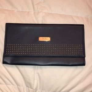 Sleek navy clutch with stud detail